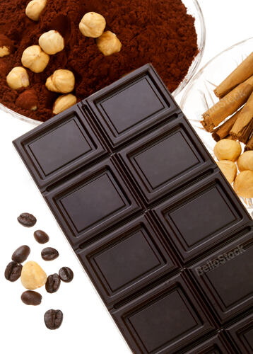 Chocolate with coffee beans, cocoa powder, cinnamon and drie
