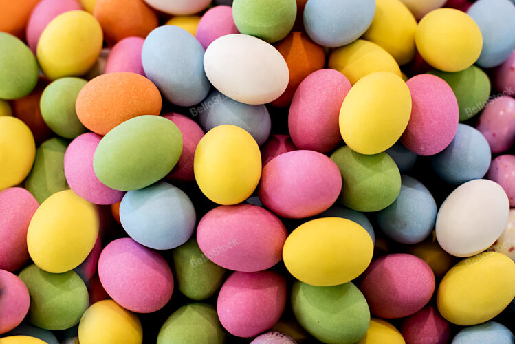 Background of colorful sugar-coated chocolate Easter eggs in