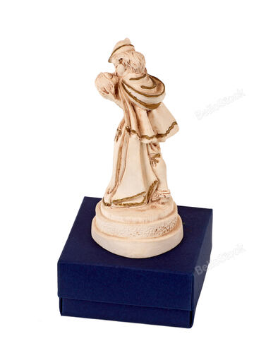 Statue of Romeo and Juliet while kissing on white background