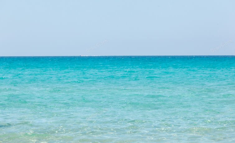 Beautiful sea with turquoise water and golden beach in Galli