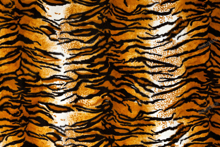Close up shot of tiger print carpet.