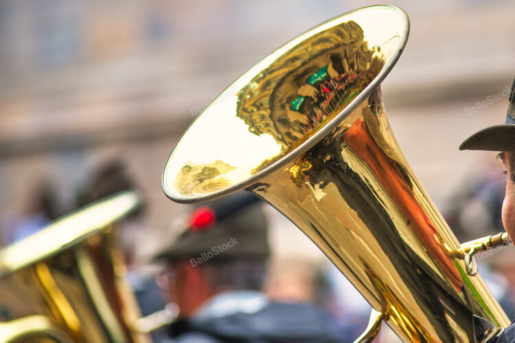 Bass tuba in an alpine fanfare during a military ceremony pa