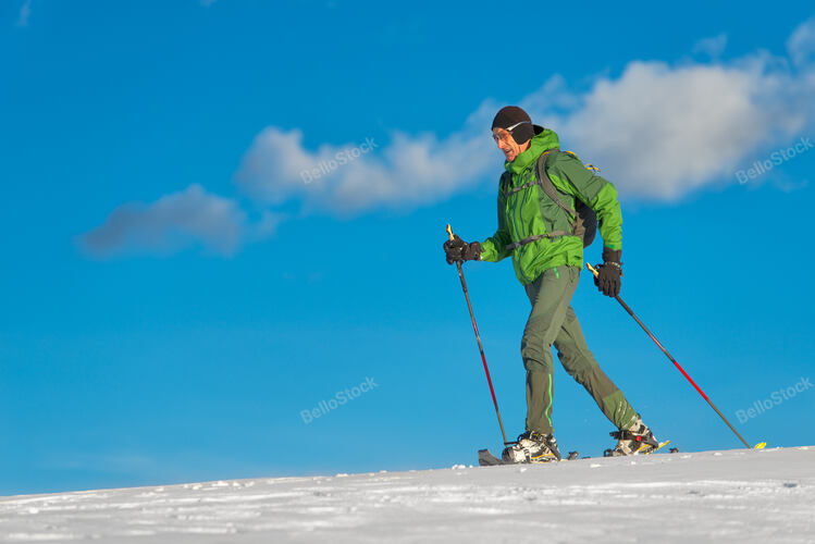 Beautiful shot of hiker in winter season.