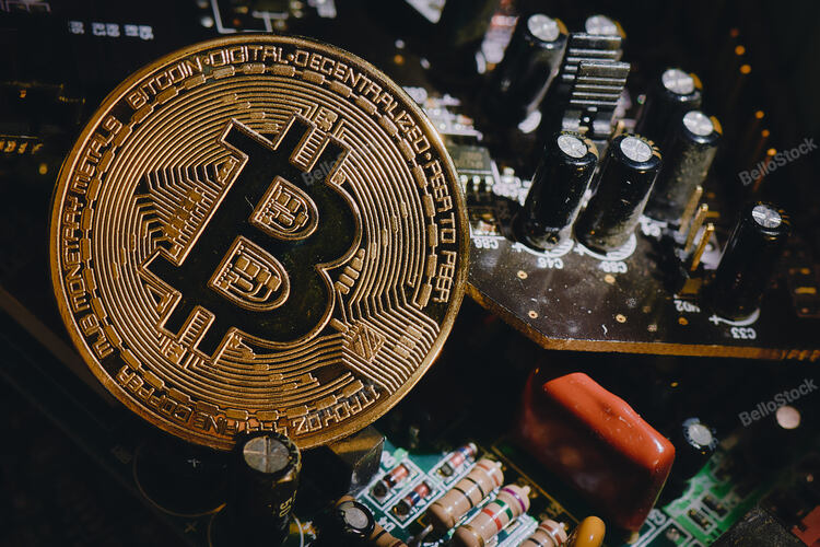 Bitcoin in. Solid shape resting in electronic computer circu