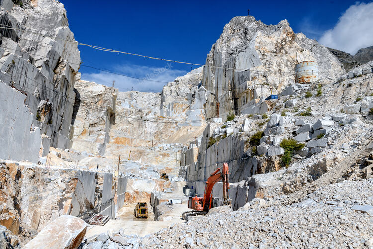 Open cast mining in a Carrara marble quarry showing the rock